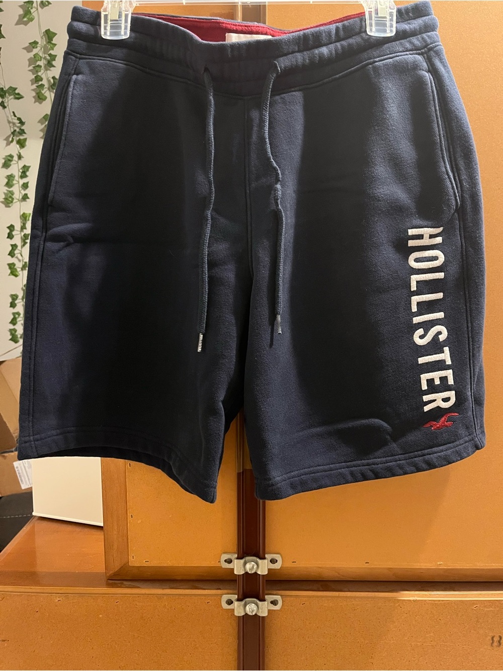 Hollister Men's Navy Drawstring Athletic Shorts with Vertical Logo